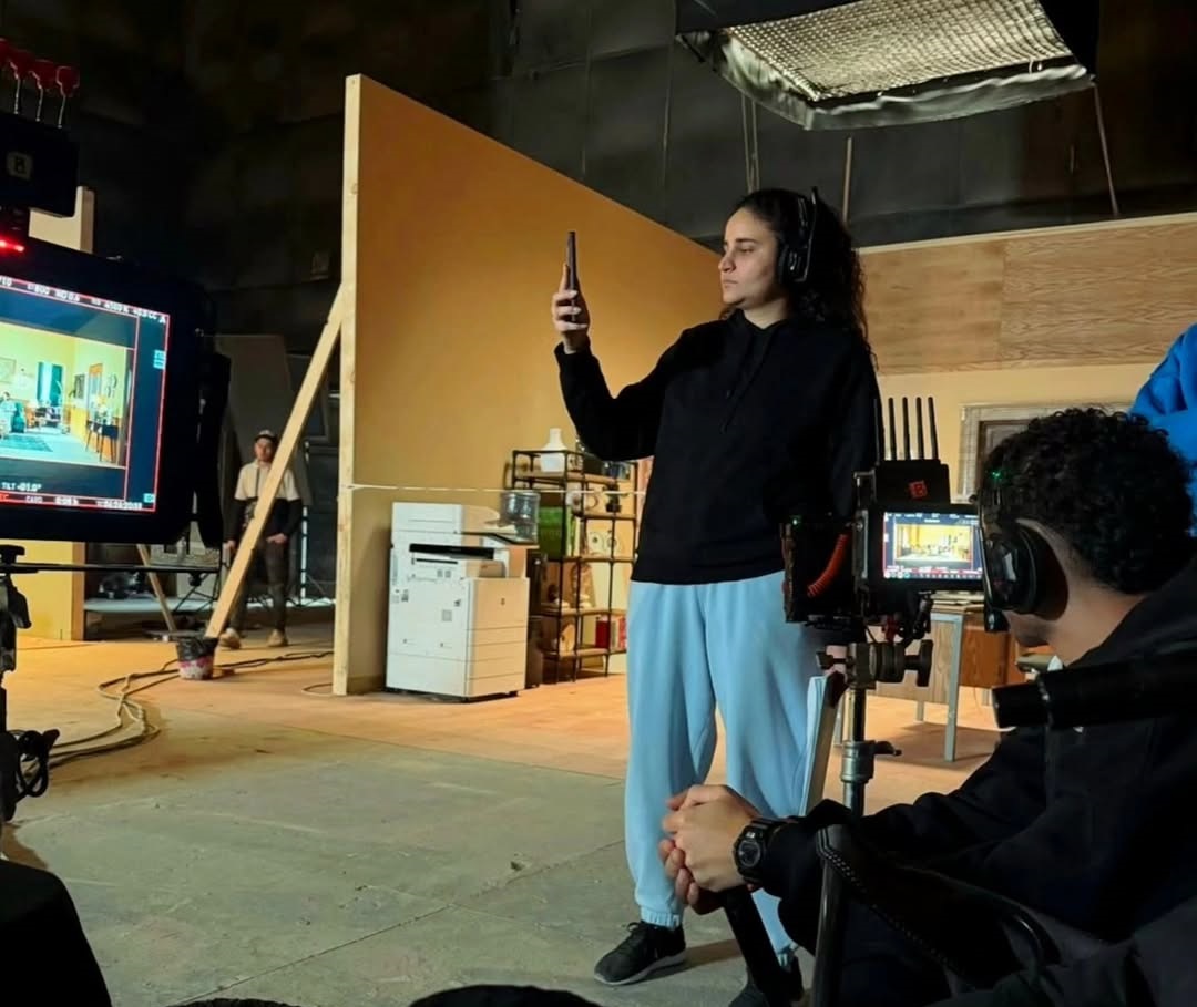 Nathalie directing headphones